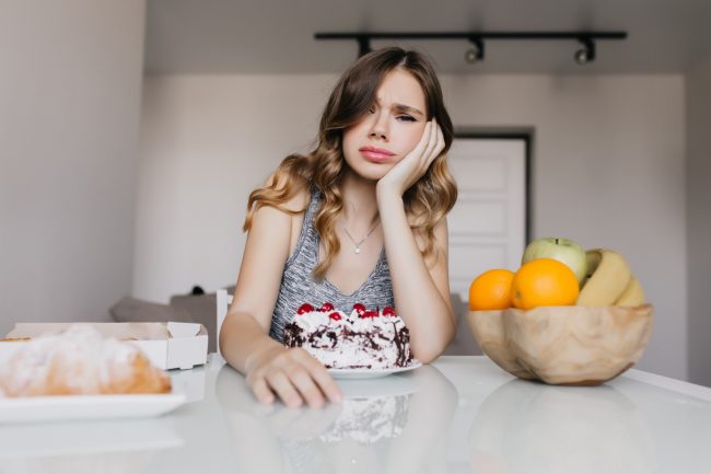 qué hacer para quitar la ansiedad de comer mucho - molestia